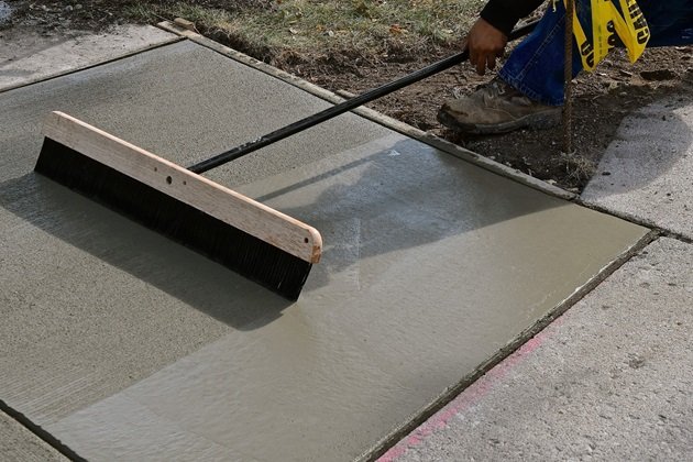 Large patch repair being performed on a residential concrete floor